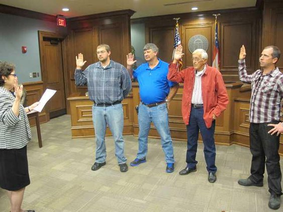 Liberty County Probate Judge Nancy Aspinwall officiates the swearing-in ceremony for Gum Branch City Council members left to right Jesse Stickland Richard Strickland Jim Chandler and Charles Simpson