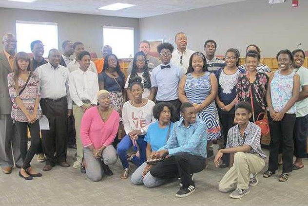 The youth participants and coordinators of the Career Readiness program gather together for a photo with the Liberty County Board of Commissioners