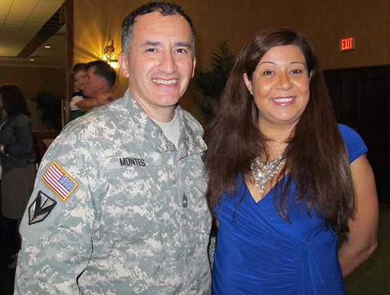 Volunteer Rubi Blancas with husband MSG Gabriel Montes