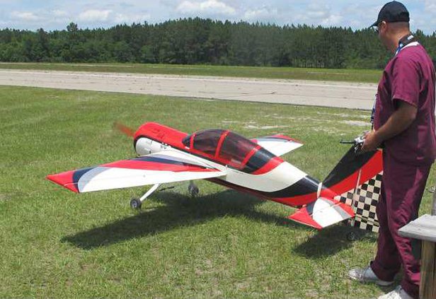 Dr. Dan Green preps  model plane for take-off