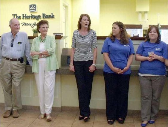 Melissa Deal speaks at the Heritage Bank Business After Hrs in Long Co