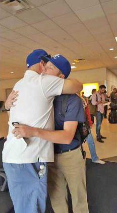 RichardHugsHisDadAtAirport