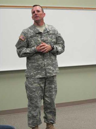 Colonel Kevin F Gregory giving his State of the Garrison Address at the Progress through People Luncheon