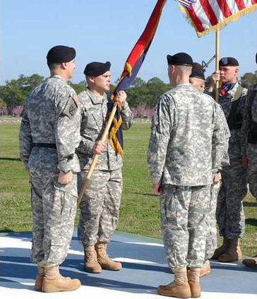 new 4th Brigade commander Col. Lou Lartigue takes flag