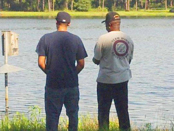 Donald Spencer DAV Chapter 46 senior vice chair right with WTB soldier fishing for the first time in his life