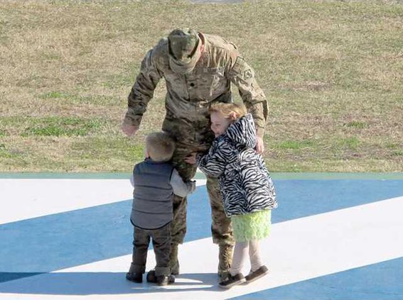 LTC Boggs with Cole 2  Bella 4 