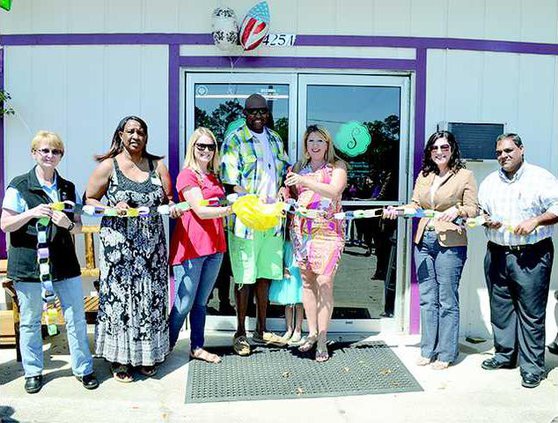 Savvy ribbon cutting