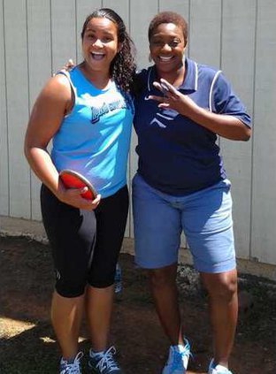 Sr. Kicha May and track coach Erica Harris