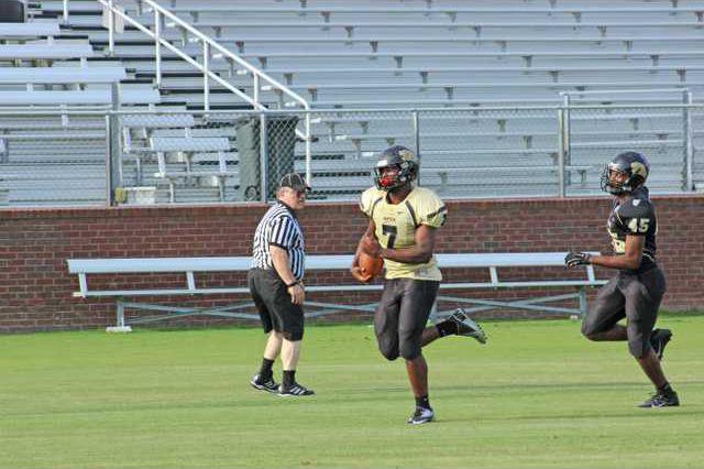 Springboard from spring football - Coastal Courier