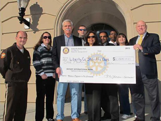 Capt. David Edwards Richelle Barrett Sheriff Steve Sikes Marcus Sack Brigette Shanken Hasit Patel David Morris Shannon Hickey and Rotary Club Pres. Tom Jackson