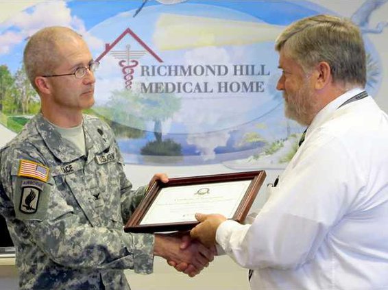 Col. Ron Place and Desi McMullan