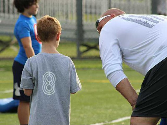 Jablonski having a word with a young athlete.
