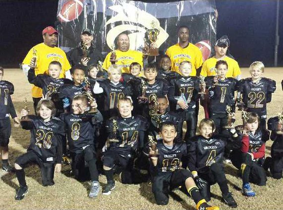 John Dunivan center with SBCR U8 Coaches Players The team took the Disctrict Champ Title in 2014
