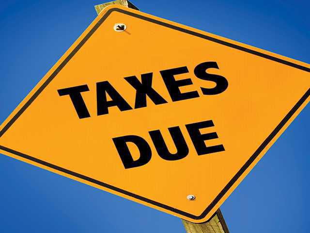 Tax Due Sign Liberty to increase property taxes - Coastal Courier