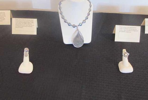 jewelry display with breast cancer awareness cards