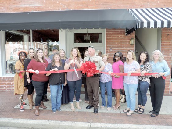 BIZ ribbon cut emma janes.JPG