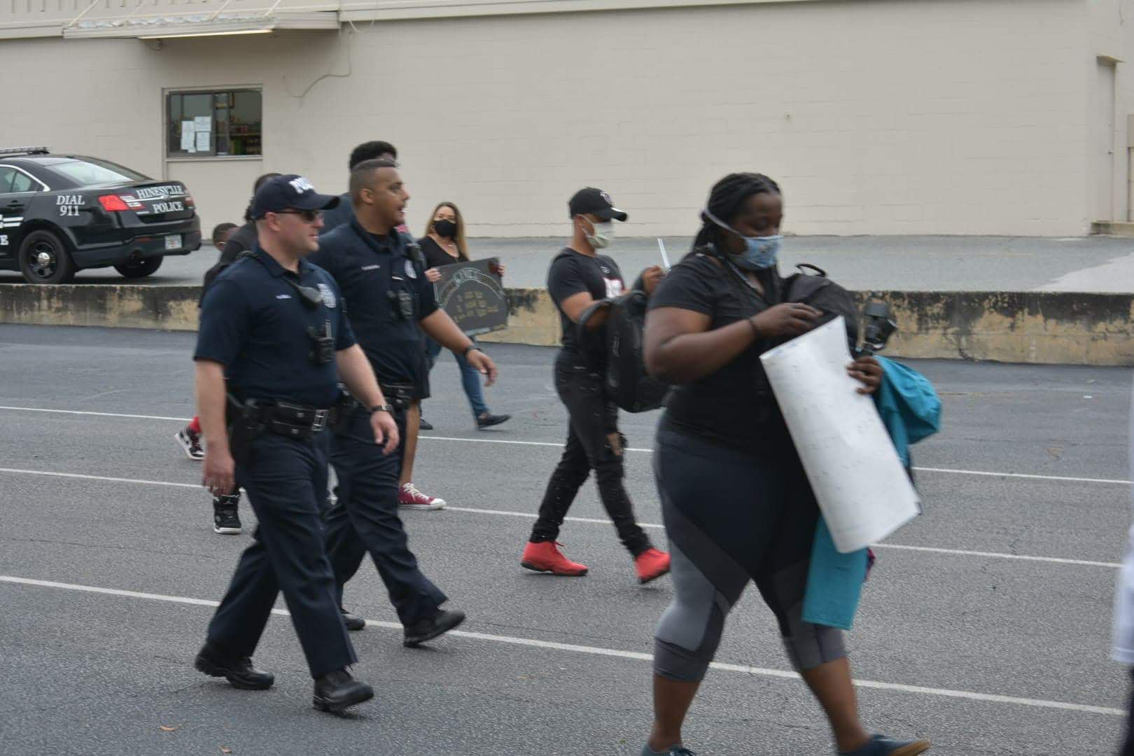 cops walking with group