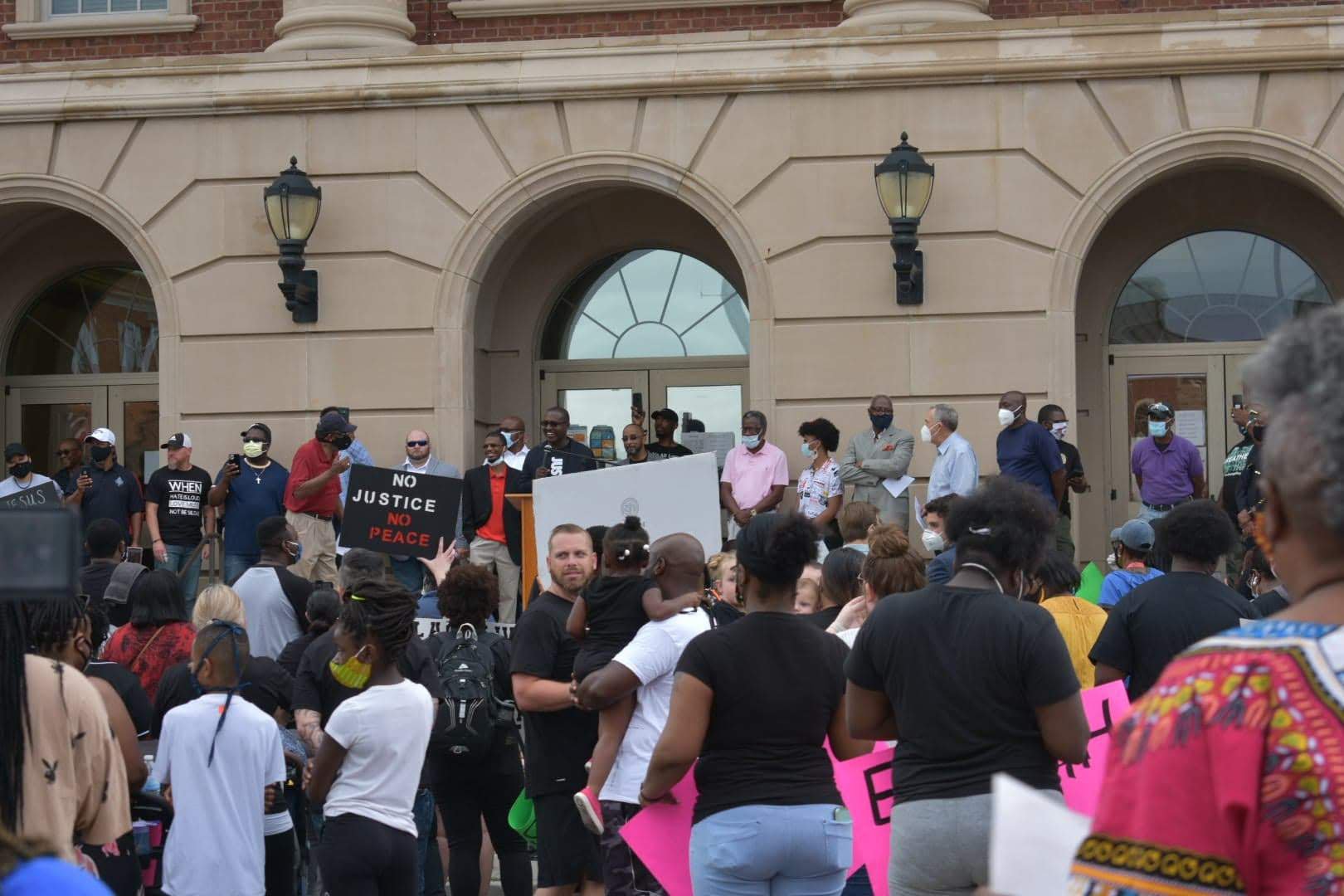 crowd gathers at Justice Center