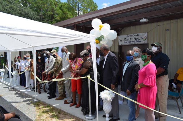 ribbon cutting manna house
