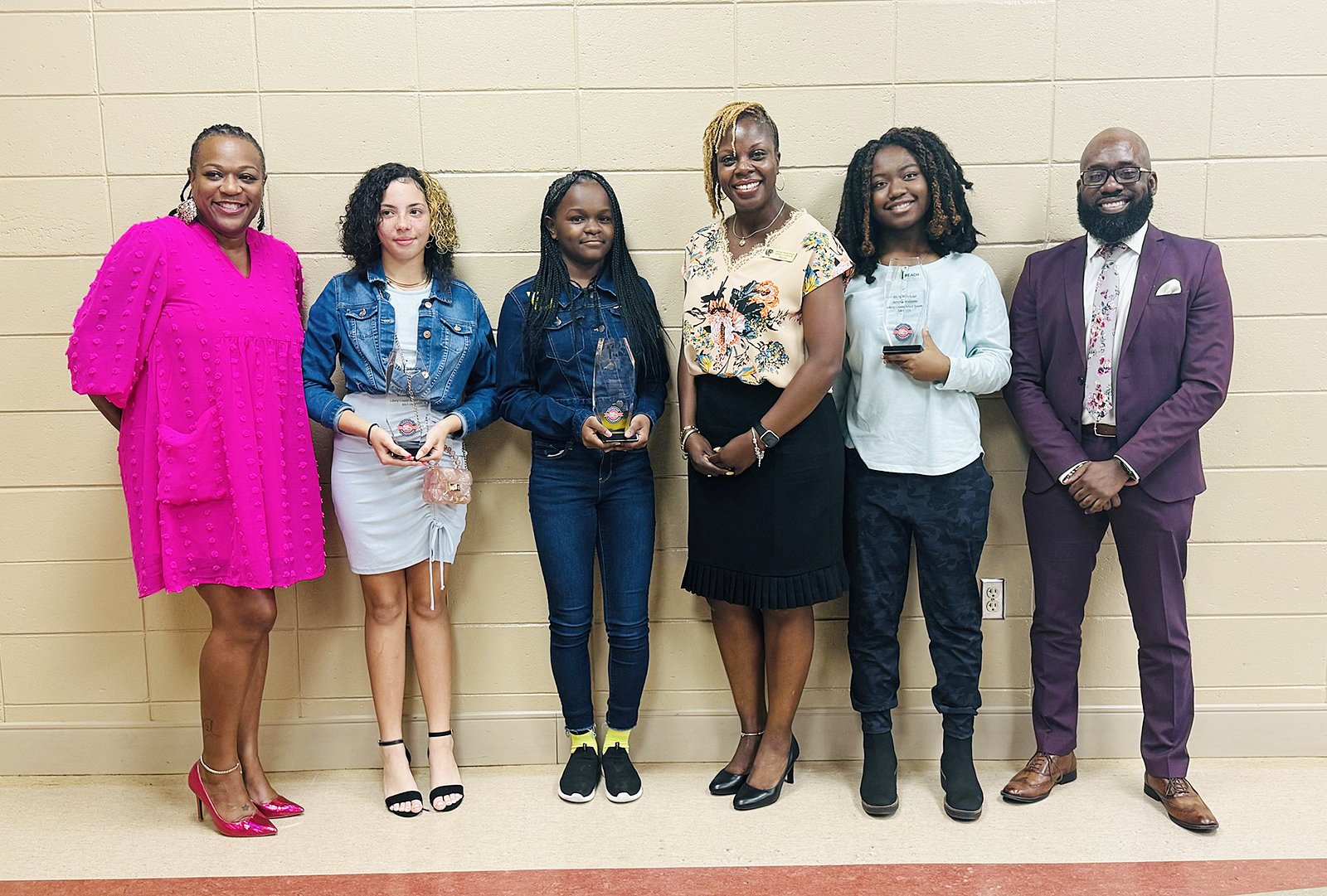 Three eighthgraders sign contracts to finish high school, enroll in