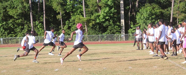 McMillan returns home to put on camp