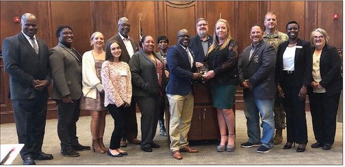 Poole named Defense Community Champion