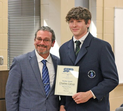 First Preparatory Christian STAR Student Logan Brown and his STAR Teacher, Dr. Charles Canup