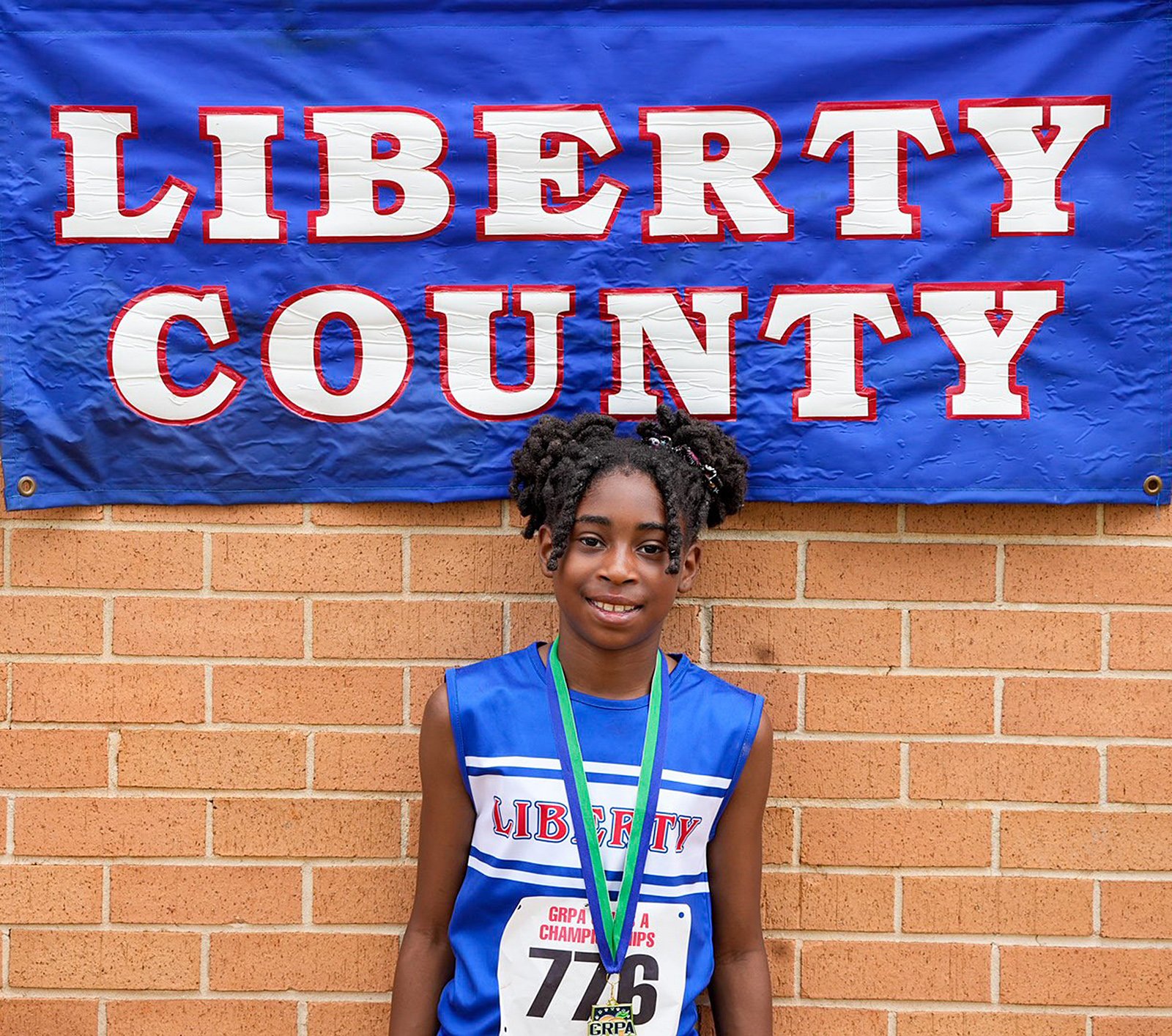 Ameira Zerangue won the girls 10U high jump