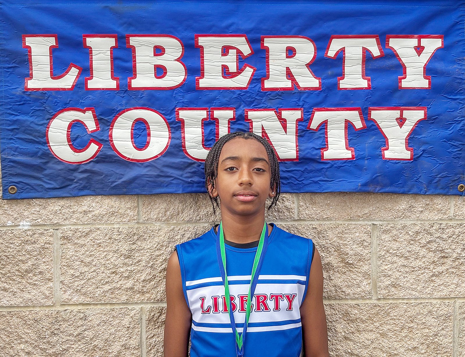 Breion Richardson won the boys 12U 400-meter dash.