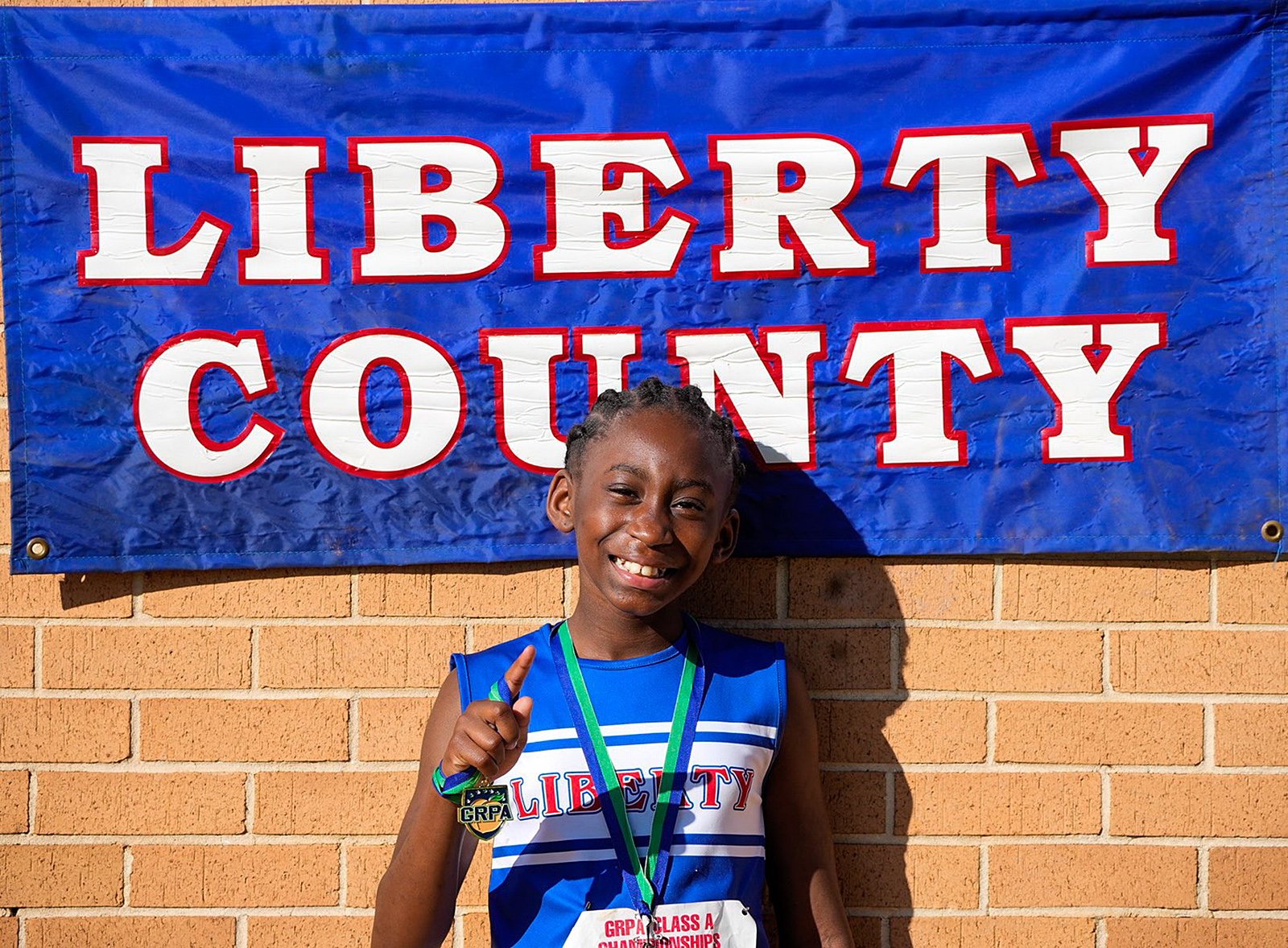 Janelle Perry won the girls 10U triple jump