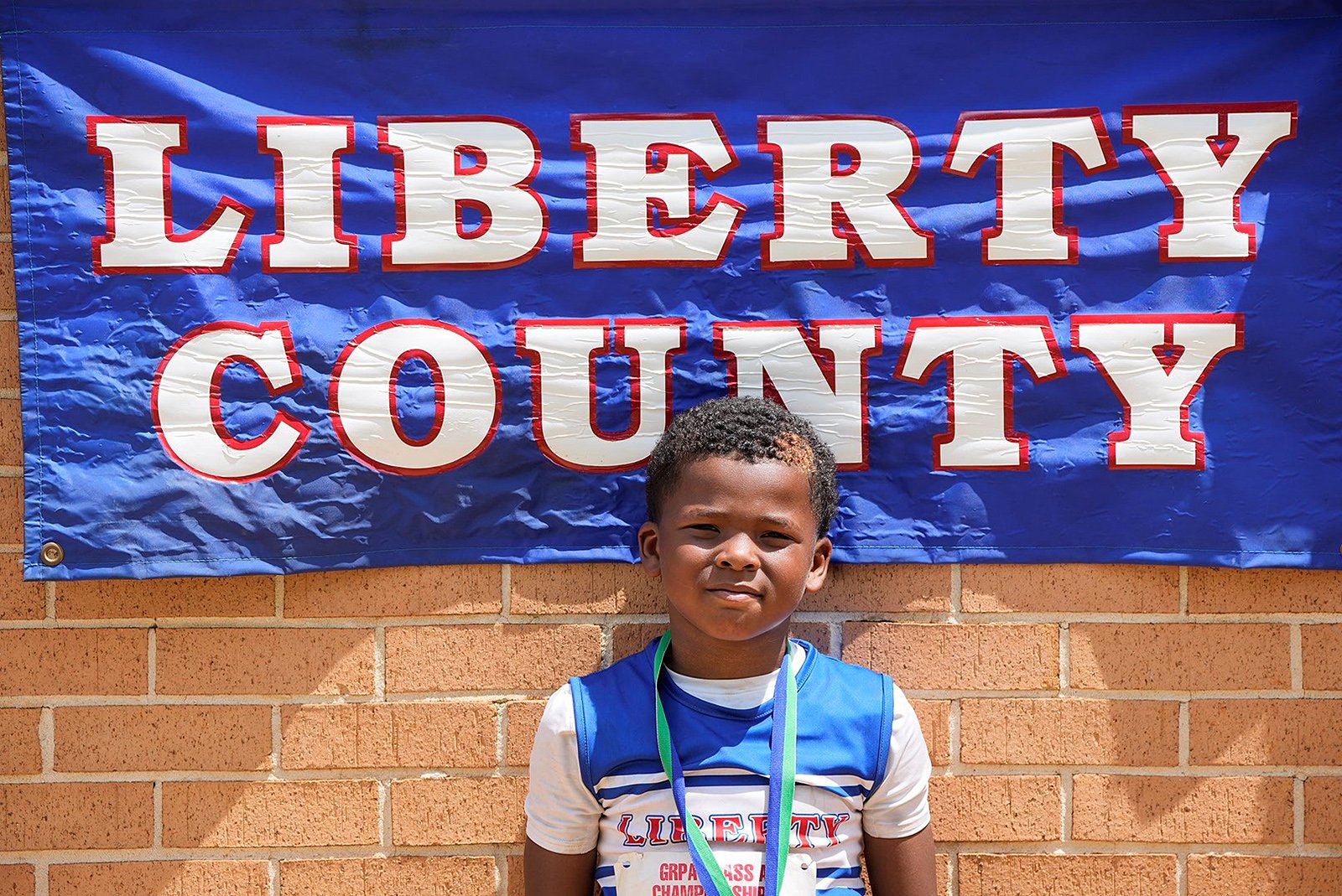 Romeo Daughtry won the boys 8U softball throw.