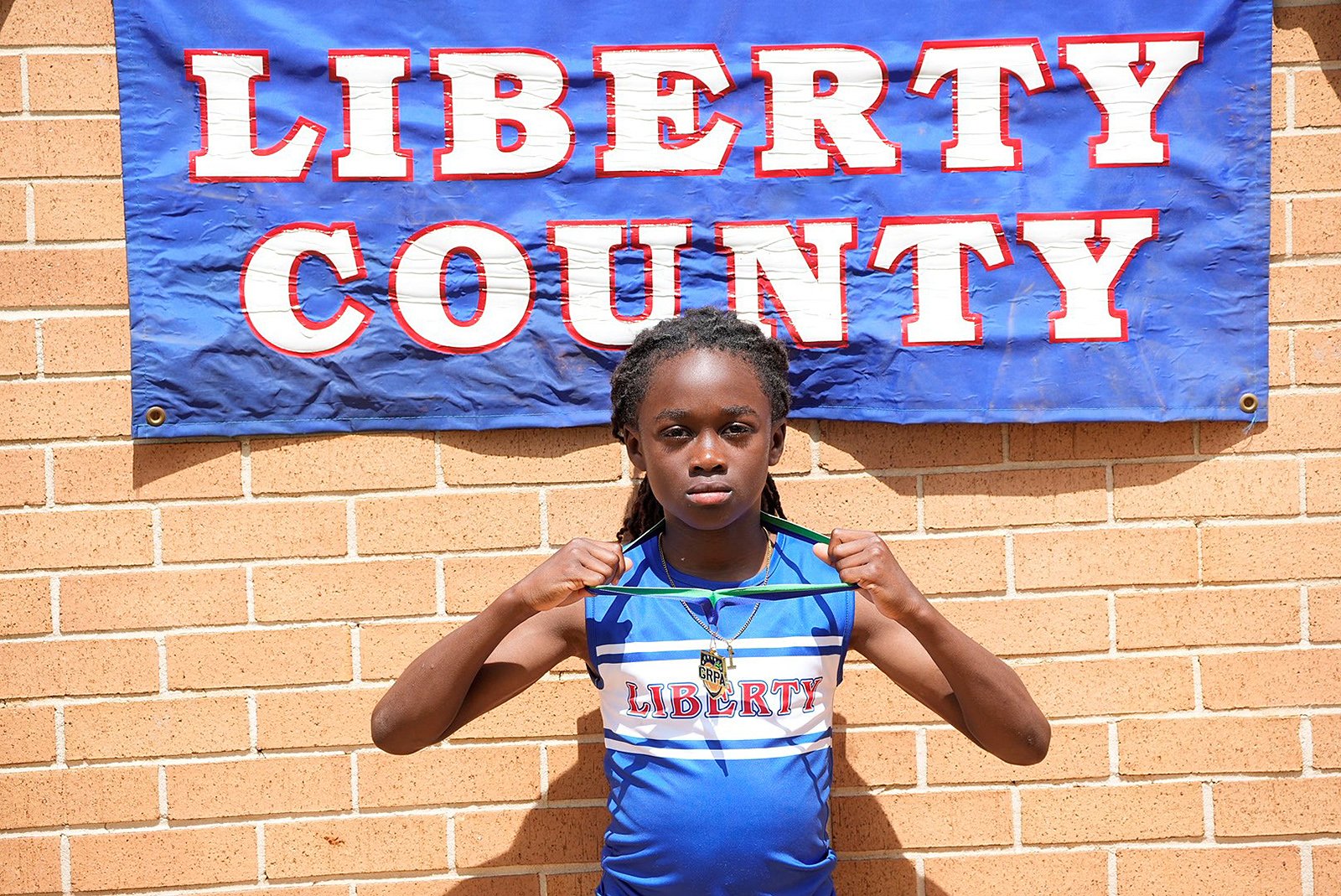 Tristen Green won the boys 10U 50-meter dash and high jump