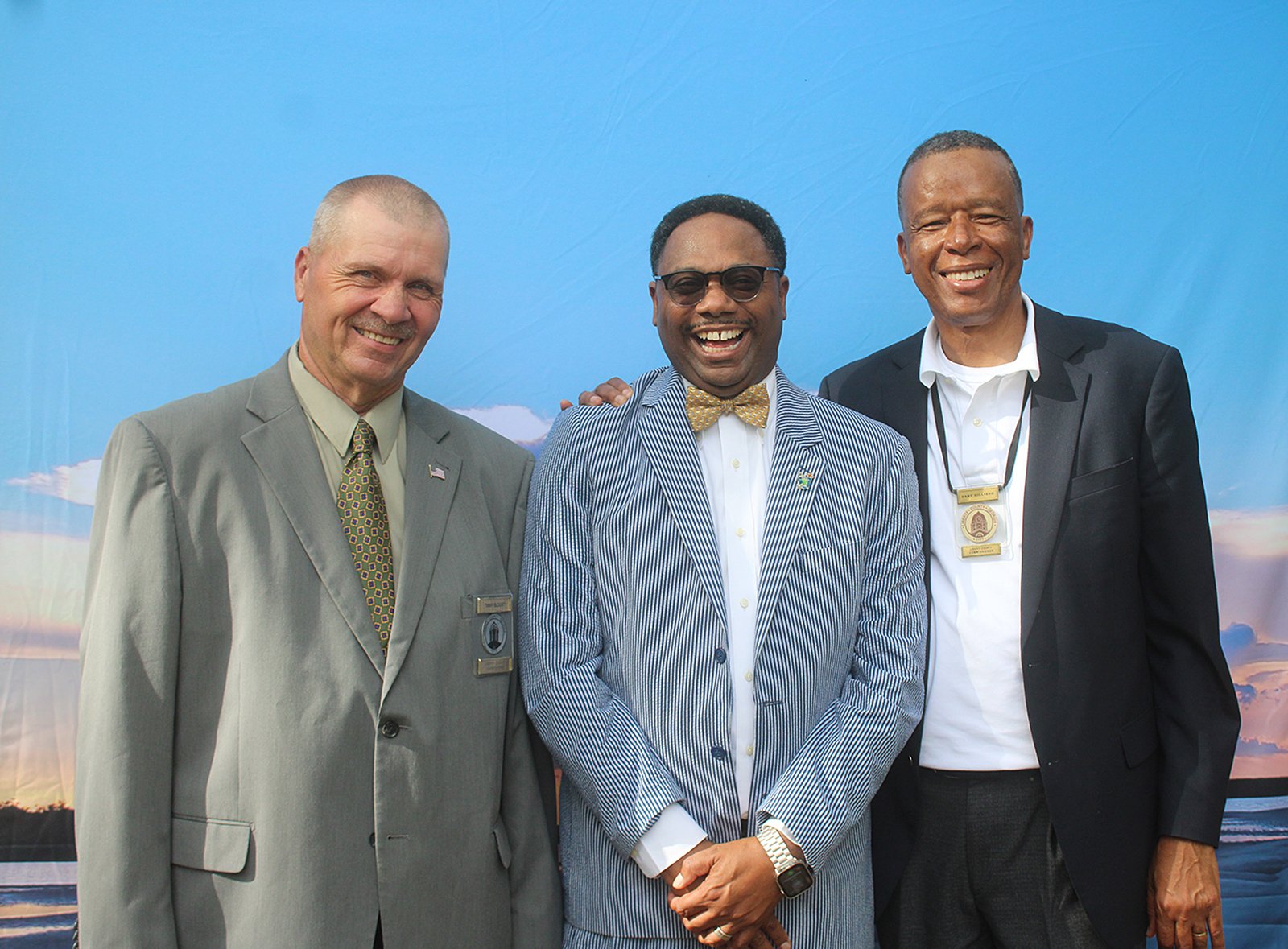 County commissioners Tim Blount, left, and Gary Gilliard, right, pose with Joseph Mosley.