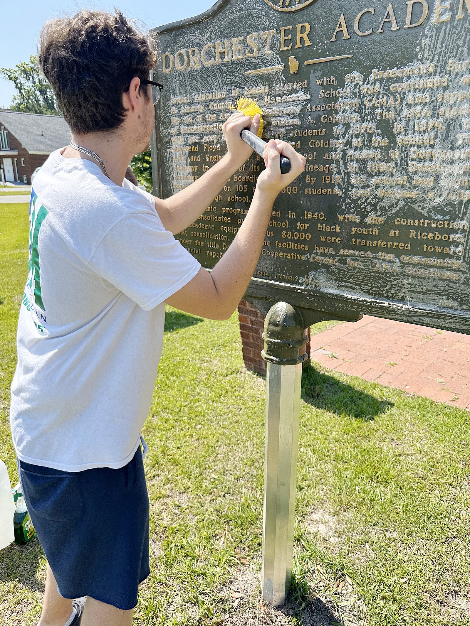 Liberty County CVB applies elbow grease to clean markers
