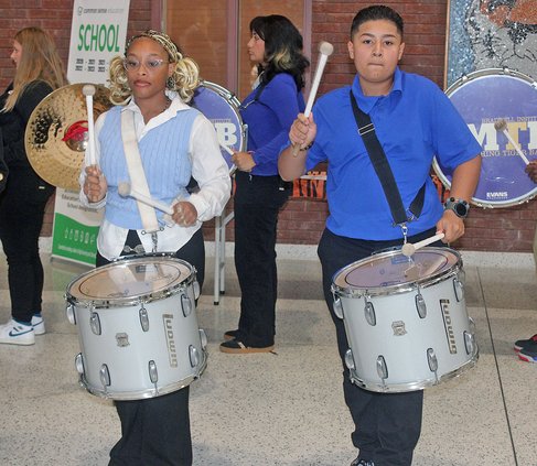 the BI band’s drum line welcomes students on Wednesday’s first day.
