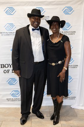 Edna Walthour greets the Boys and Girls Club of Liberty County’s Humanitarian of the Year Billy Jones.