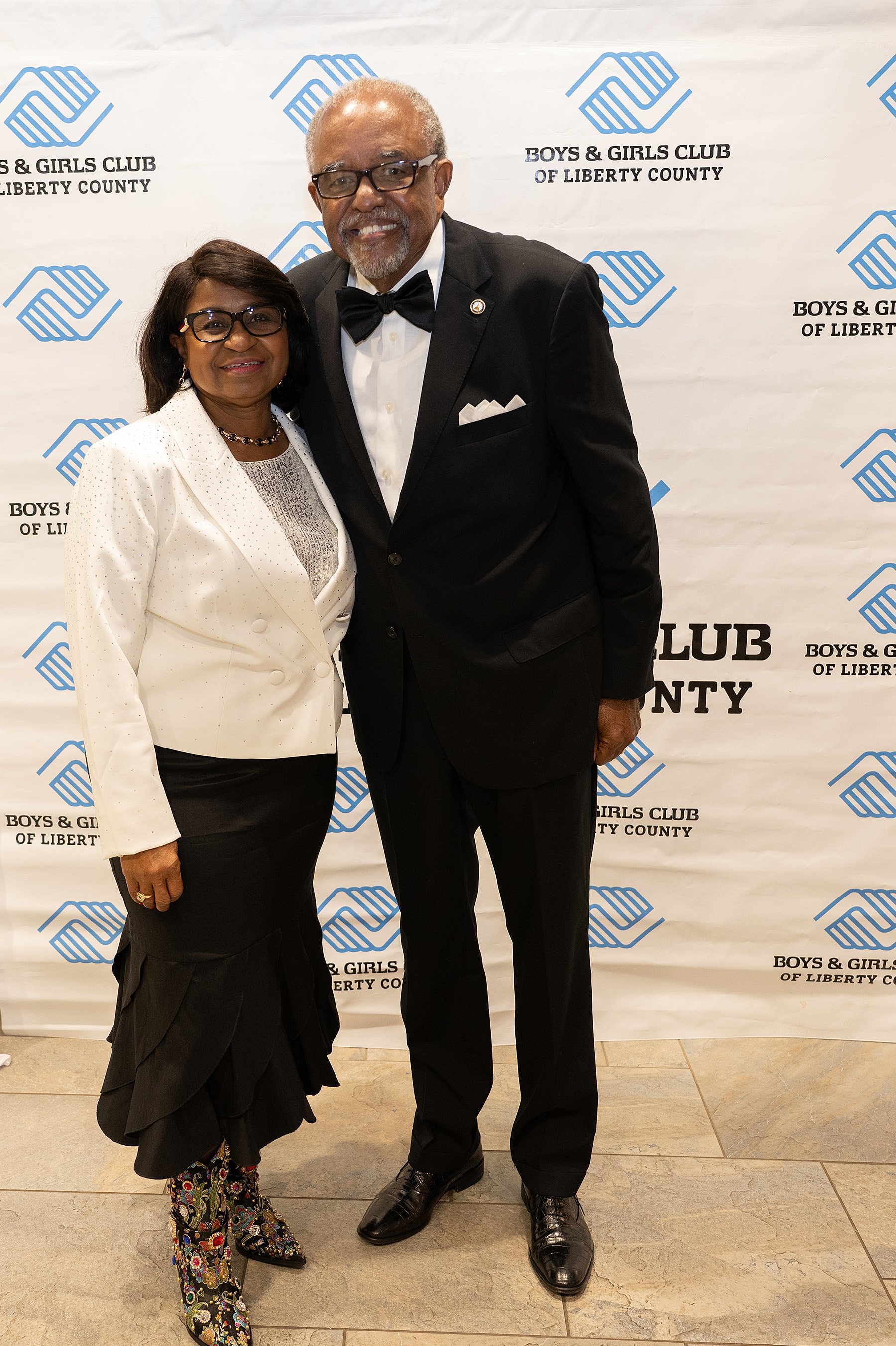 Edna Walthour greets the Boys and Girls Club of Liberty County’s Humanitarian of the Year Billy Jones.