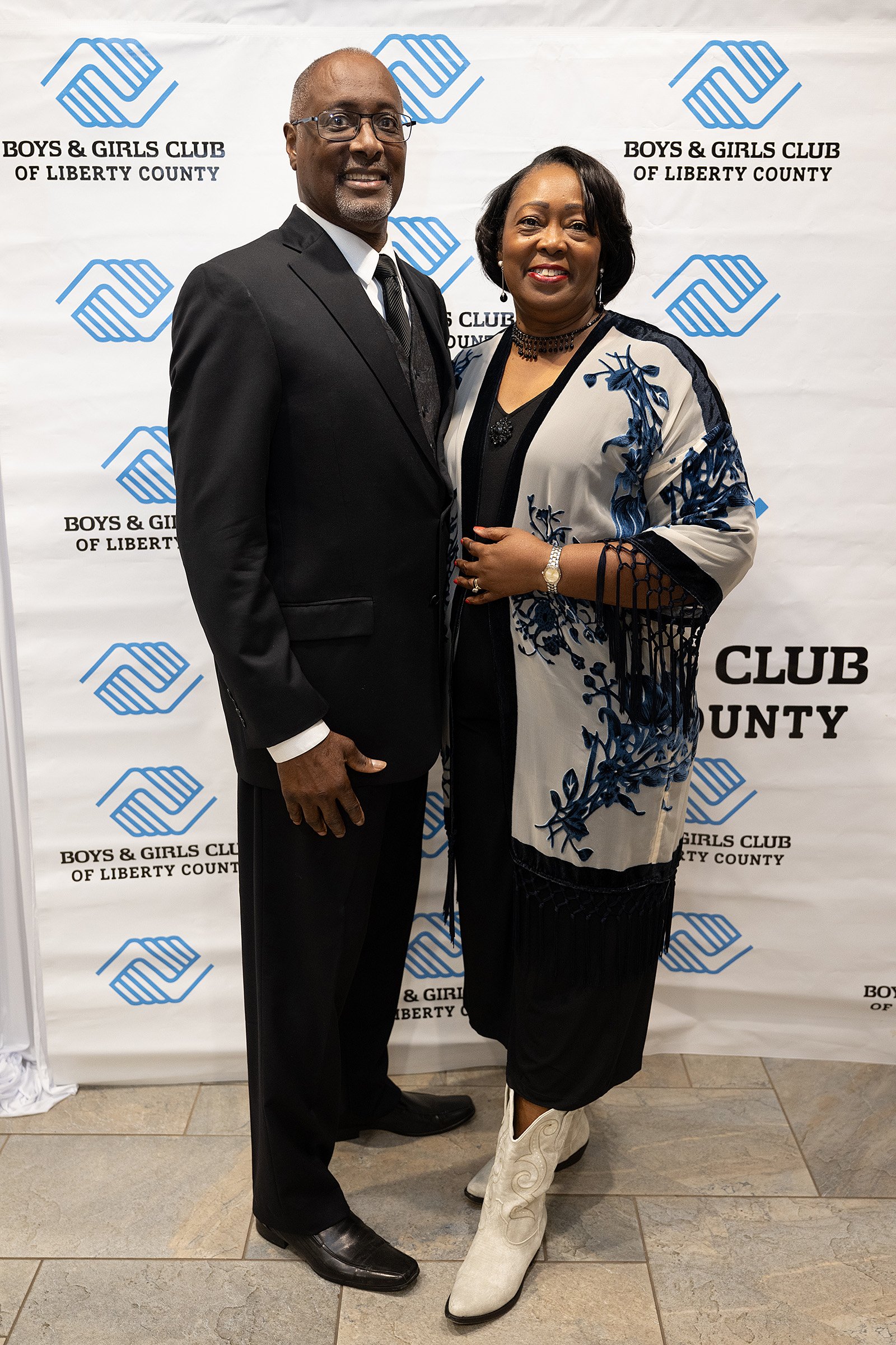 Edna Walthour greets the Boys and Girls Club of Liberty County’s Humanitarian of the Year Billy Jones.