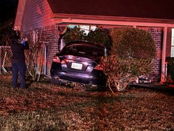 car hits house Christmas
