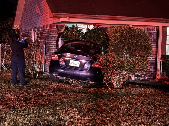car hits house Christmas