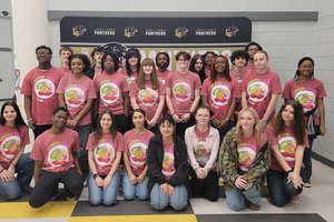 Liberty County High School FFA members show off their chapter shirts.