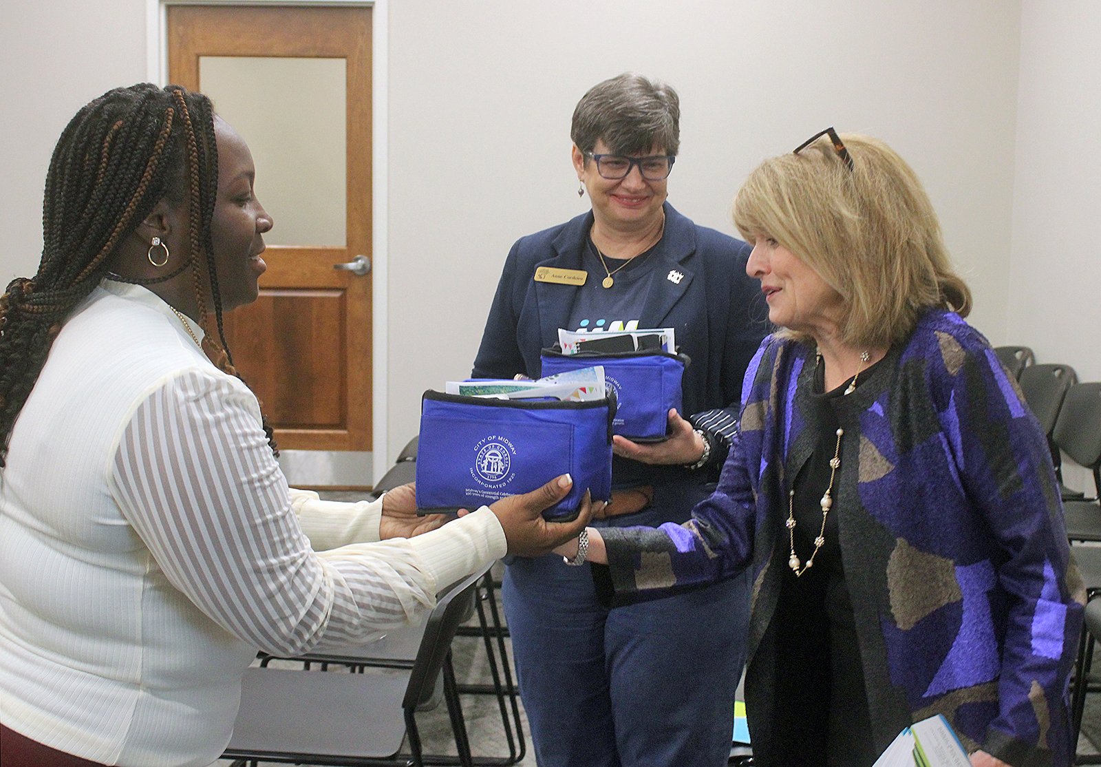 CI staff received gifts from the City of Midway for their efforts.