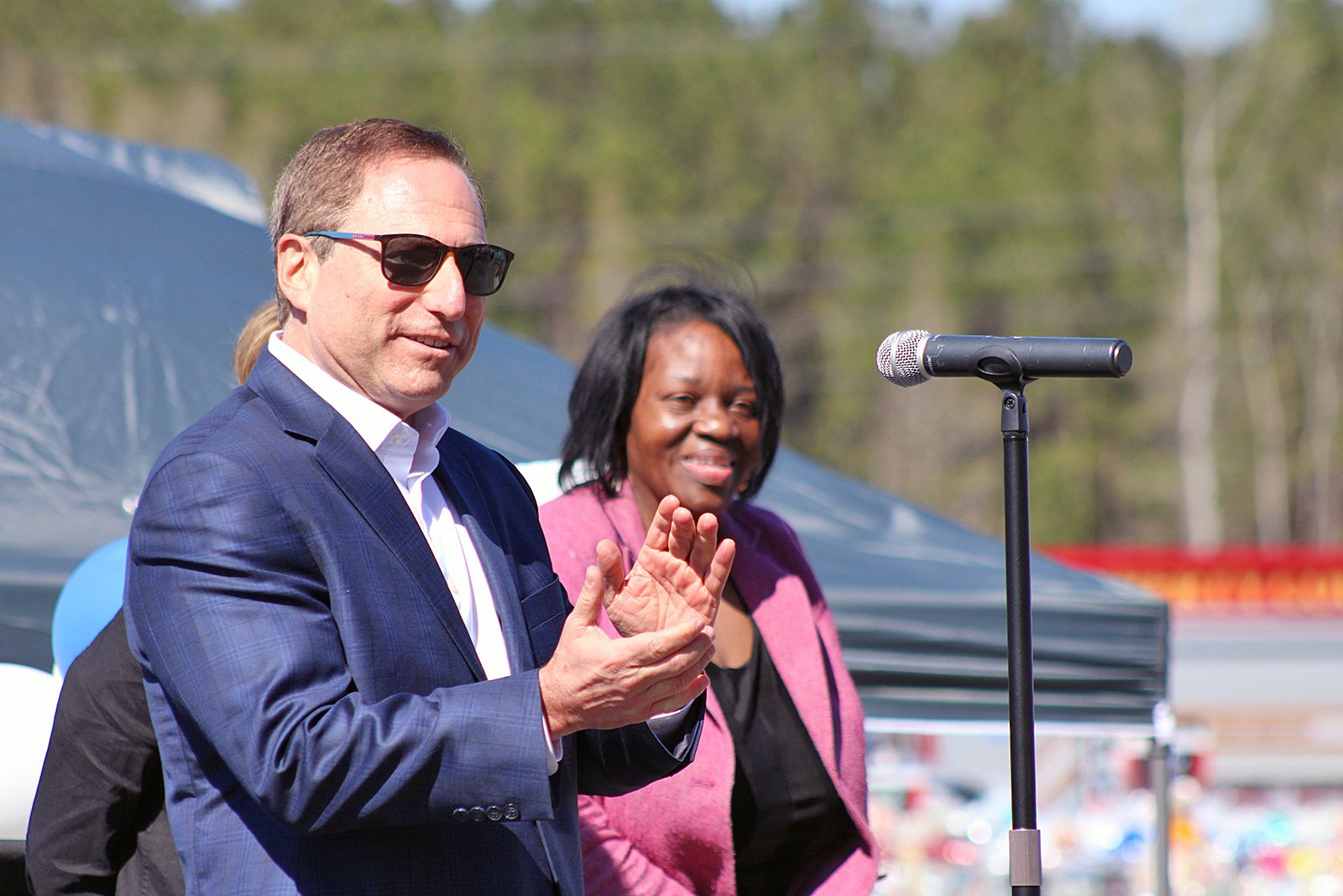 Michael Jacobs of GXO applauds the opening of the Hasbro distribution facility