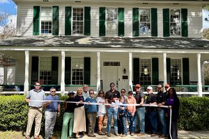 Chamber helps Summit Tree & Land Solutions with ribbon cutting