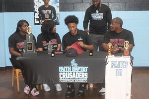 Grant Frazier signs