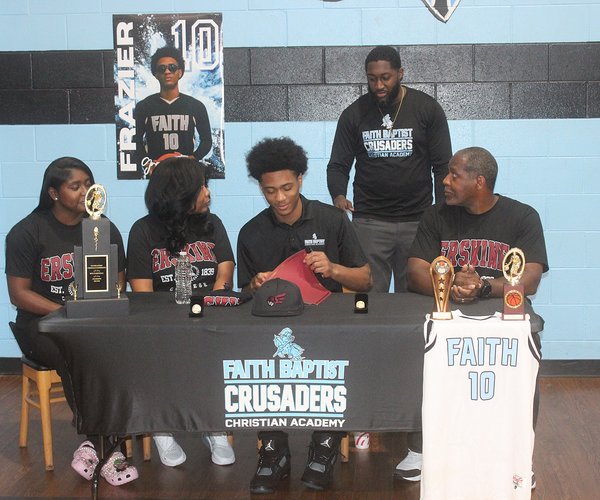 Grant Frazier signs