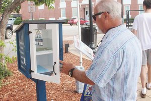 Kiwanis fill little library with stories of inclusion