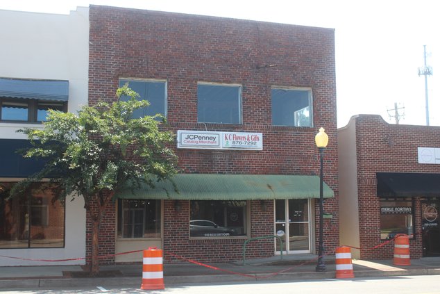 Main Street building damaged in storm to come down in stages