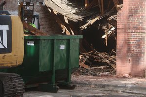 Main Street building damaged in storm to come down in stages